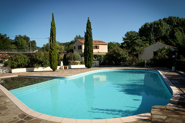 Swimming pool with large sunbathing area